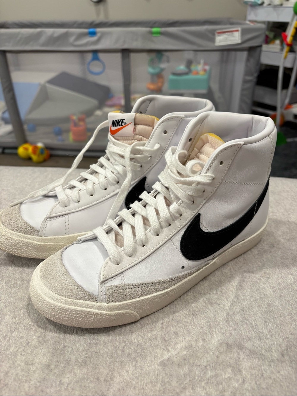 Nike Women’s White High-Top Sneakers with Black Swoosh